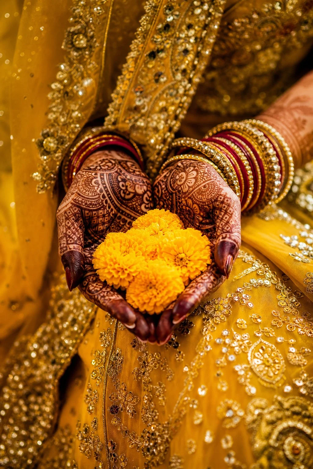 Vibrant Indian cultural fusion wedding closeup of bride hands with intricate dark henna mehndi design